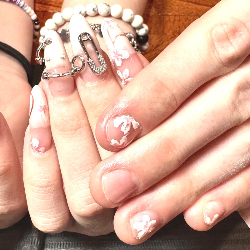Cherry blossom nails with bracelets