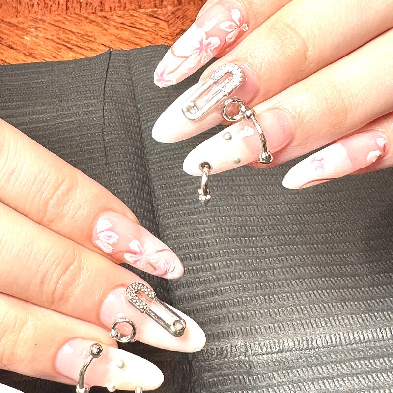 Floral nails with safety pin charms