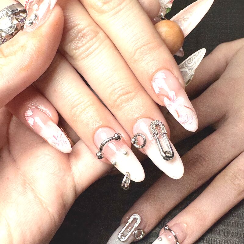 Crystal and charm nail art